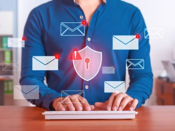 Businessman Managing Cybersecurity Threats with Antivirus Protection in Email System